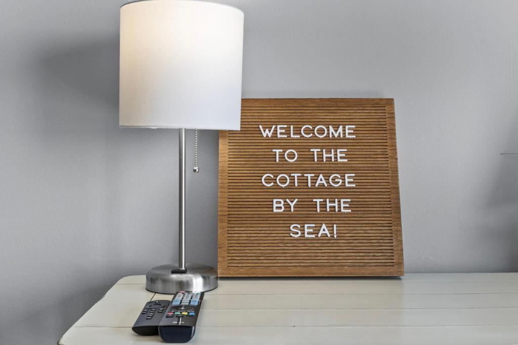 Cottage By the Sea! Renovated Condo with Ocean Views! photo 1