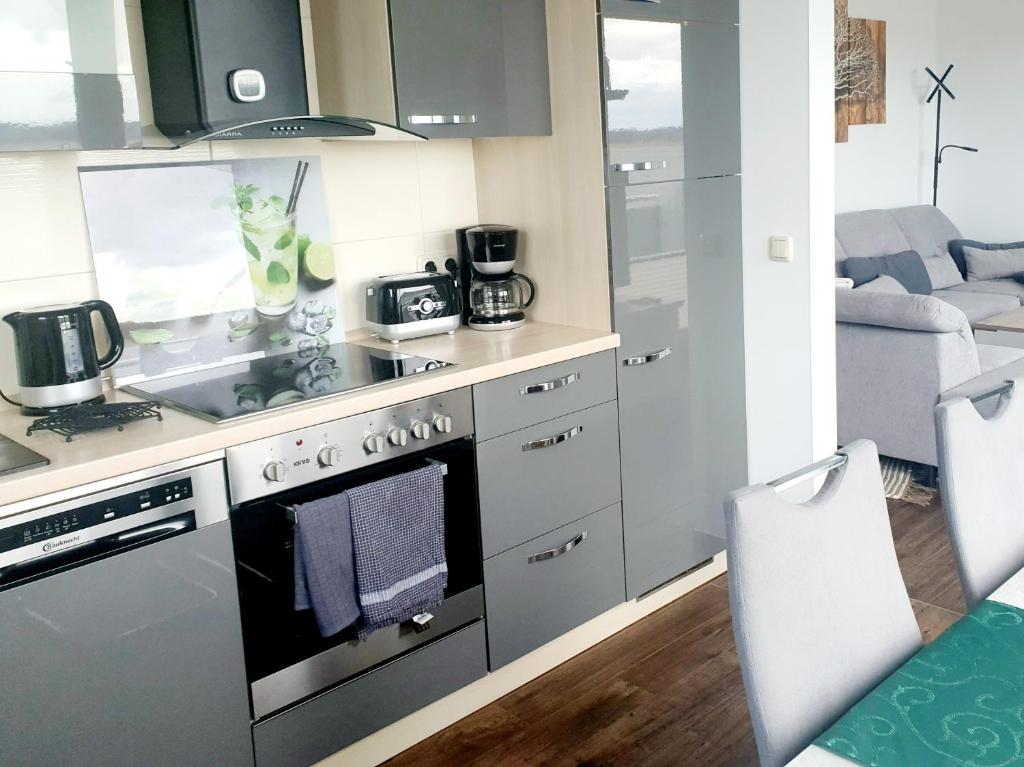 Moderne Ferienwohnung mit Balkon direkt an der Peene photo 3