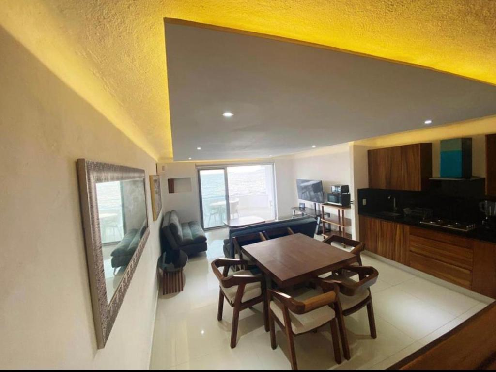 INCREIBLE DEPARTAMENTO A PIE DE PLAYA EN MANZANILLO, COMPLETAMENTE NUEVO photo 4