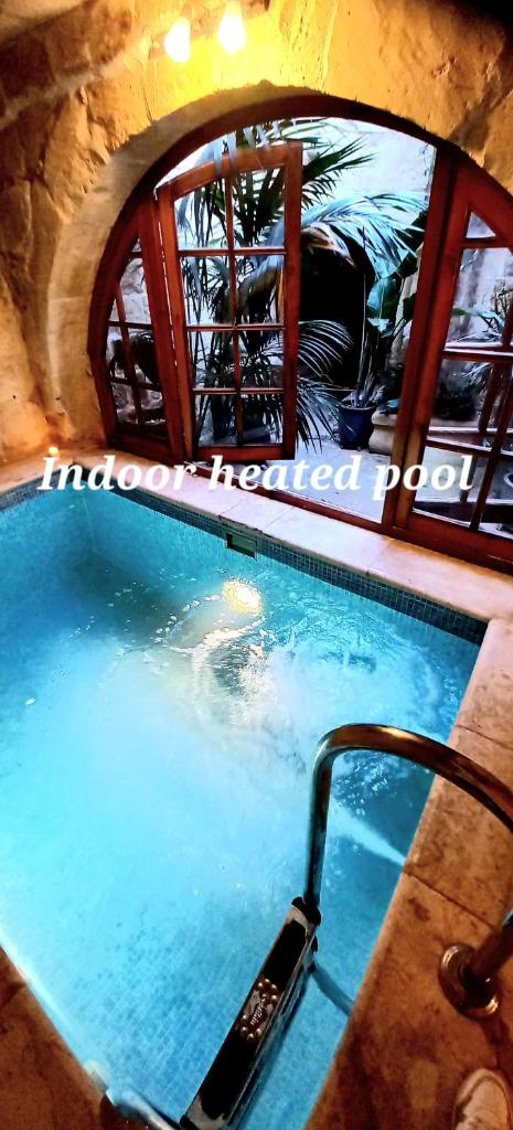 Il Mithna farmhouse with indoor heated jacuzzi pool photo 1