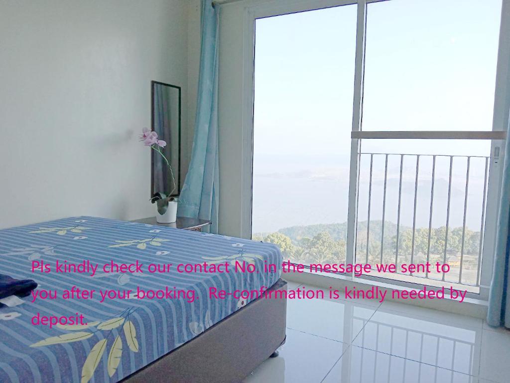 SMDC Franchesca's Taal Lake View Condo No Balcony - Studio & Partial Lake View Condo No Balcony - Standard Quadrouple Room photo 4