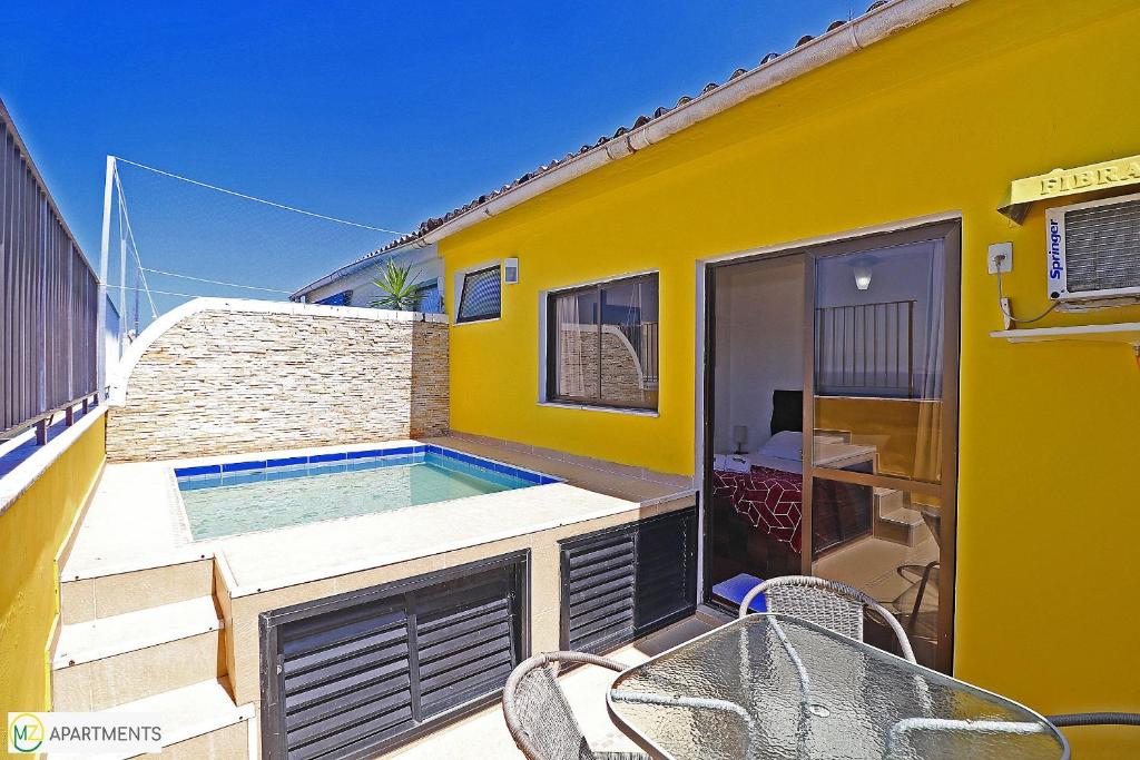 Charming duplex penthouse with pool photo 3