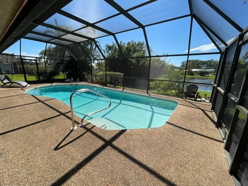 Great family home with a new sparkling pool,lovely lake view, close to beach image