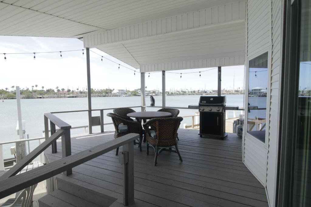 Watch Dolphins From Your Private Deck In A Resort Community Filled With Amenities! photo 1