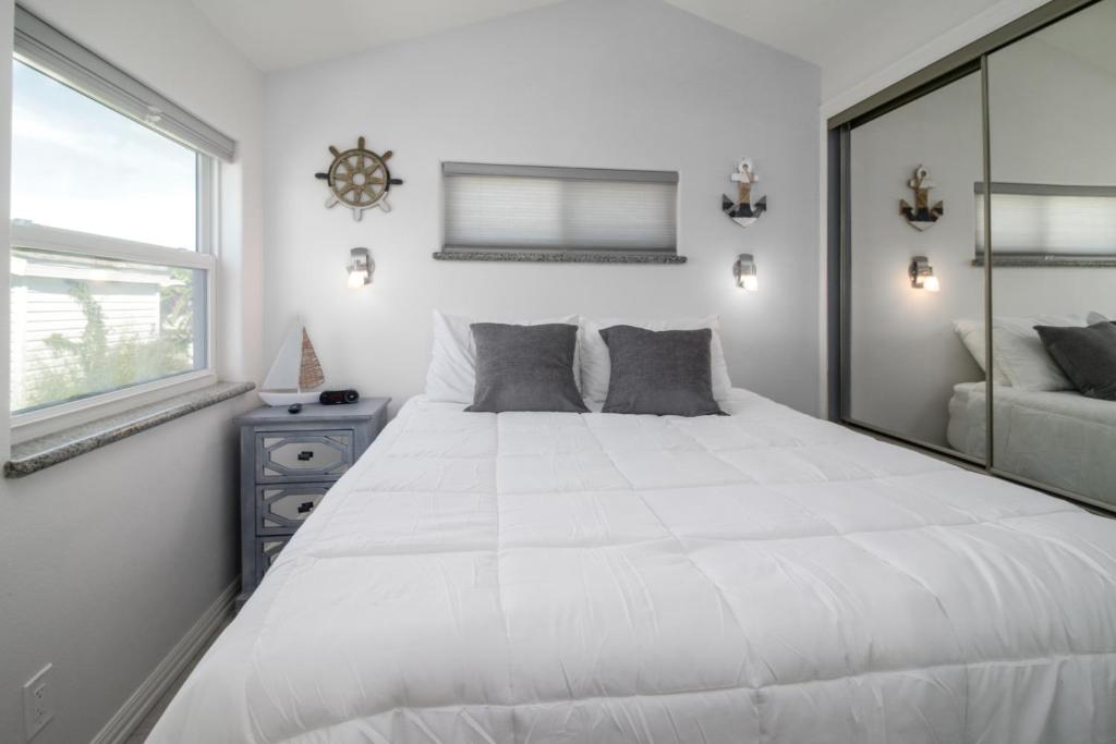 Watch Dolphins From Your Private Deck In A Resort Community Filled With Amenities! photo 4