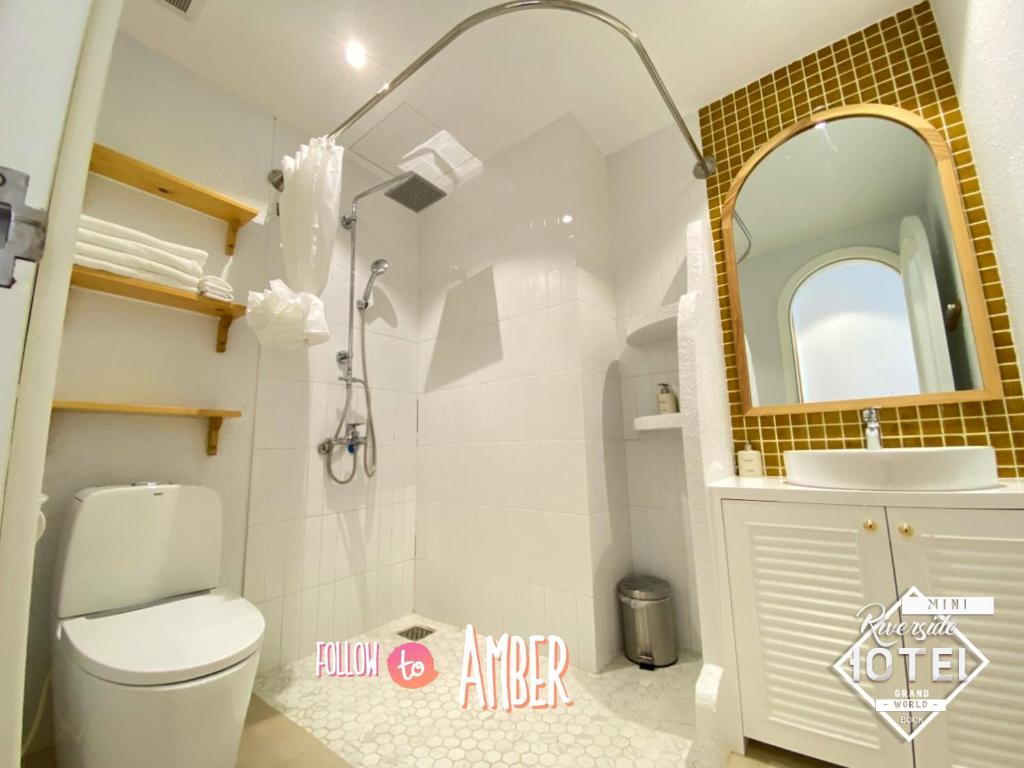 Riverside Mini Hotel Grand World - Tap to explore photos