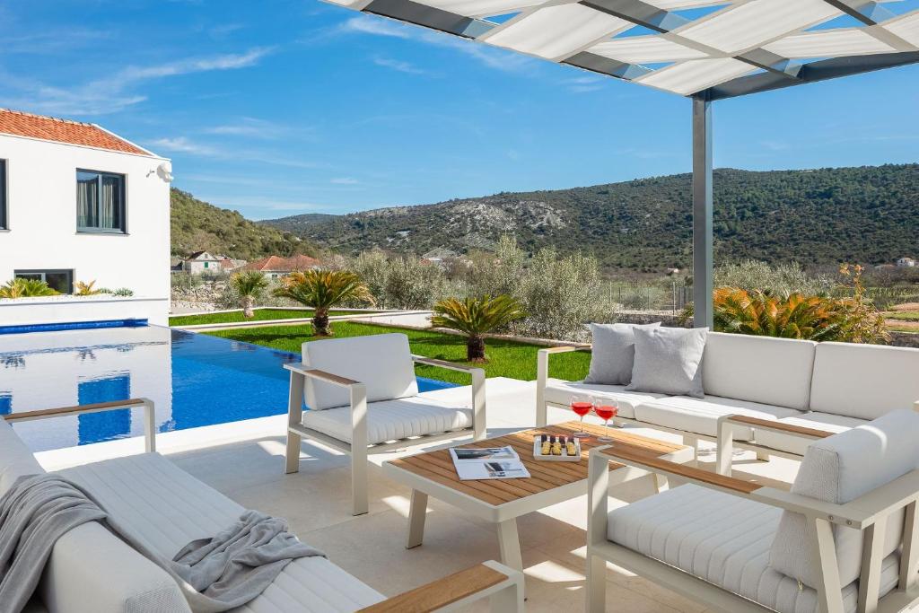 Luxury Villa Dolac by Trogir and Split, complete privacy in untouched nature with infinity massage heated pool photo 1
