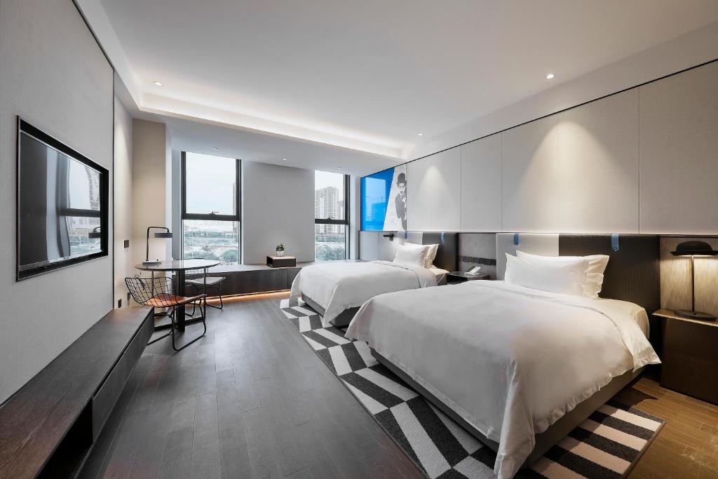 Qingdao Oriental Studio Chuangzhi SSAW Hotel photo 2