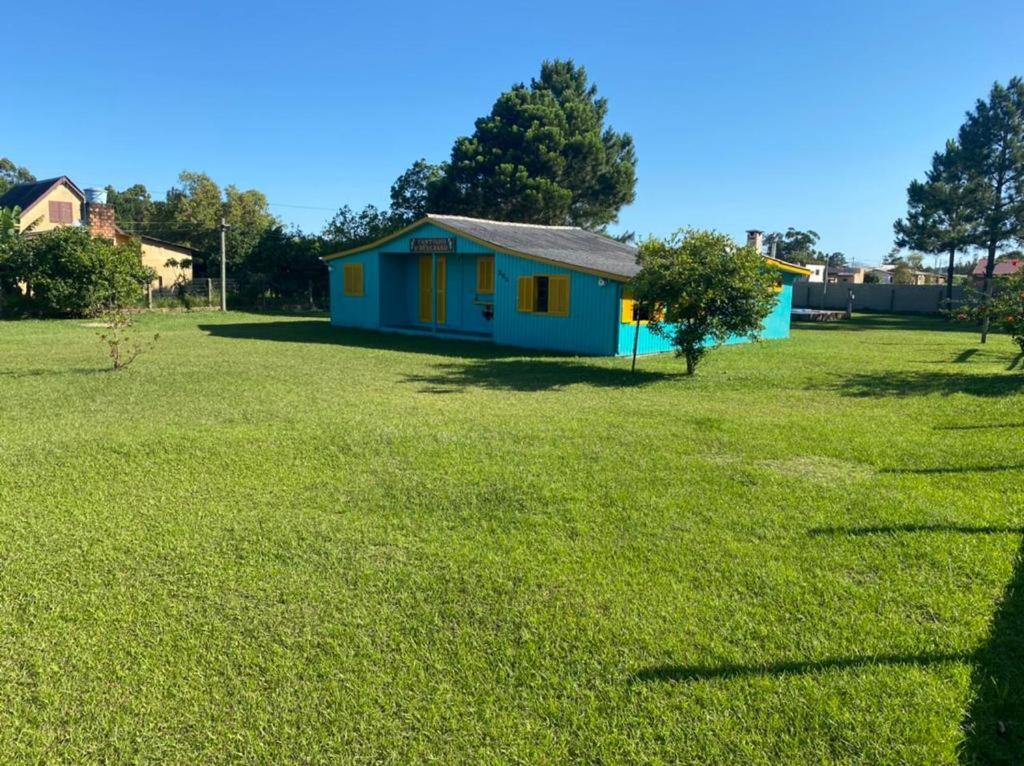 Casa com piscina e salão de jogos para aluguel de temporada e finais de semana em Torres/RS. photo 1