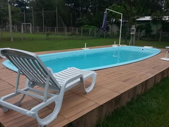 Casa com piscina e salão de jogos para aluguel de temporada e finais de semana em Torres/RS. photo 4