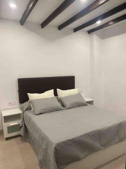Planta baja moderna y nueva a estrenar en el centro ciudad 2 habitaciones y 2 baños photo 1
