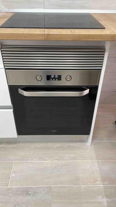 Planta baja moderna y nueva a estrenar en el centro ciudad 2 habitaciones y 2 baños photo 2