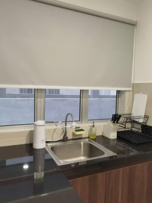 Emerald Avenue Cozy 1BR Studio Suite photo 3