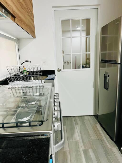 Hermoso y nuevo departamento photo 3