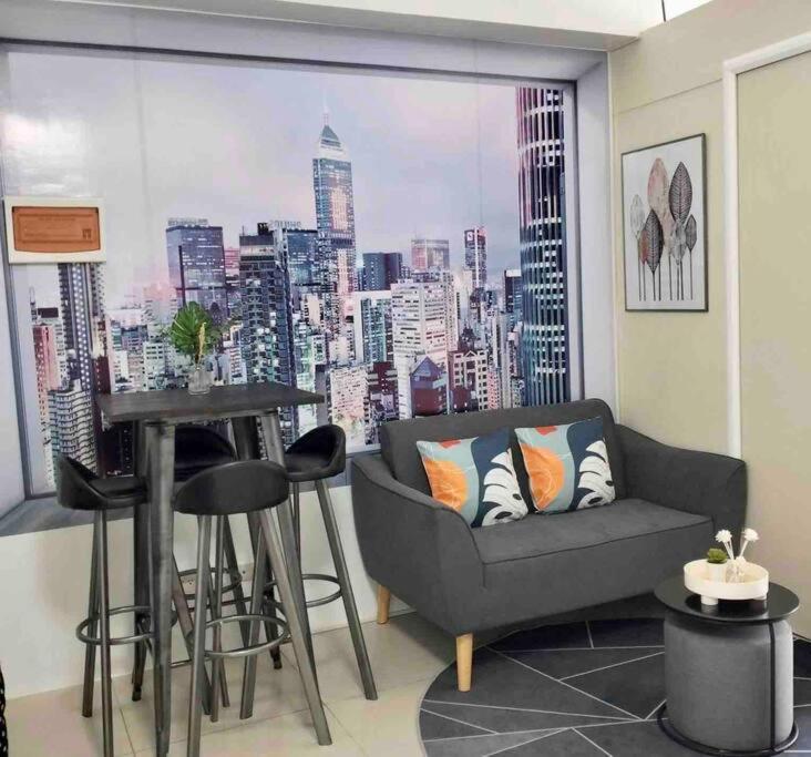 Chic 2BR Condo Unit at South Residences - Tap to explore photos