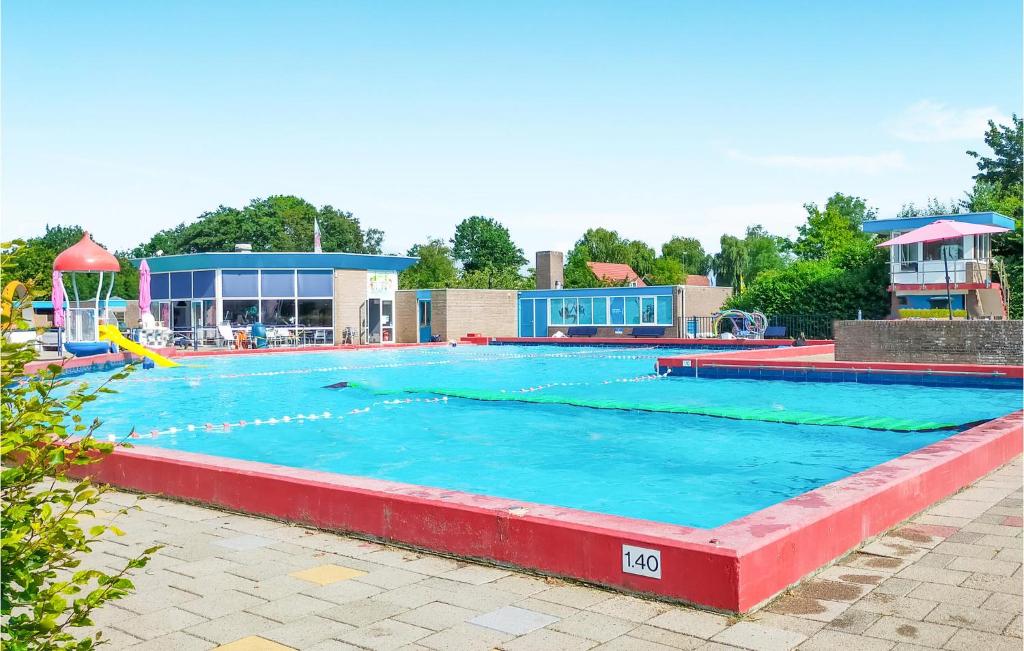 Stunning Home In Heinkenszand With Outdoor Swimming Pool, Wifi And 3 Bedrooms