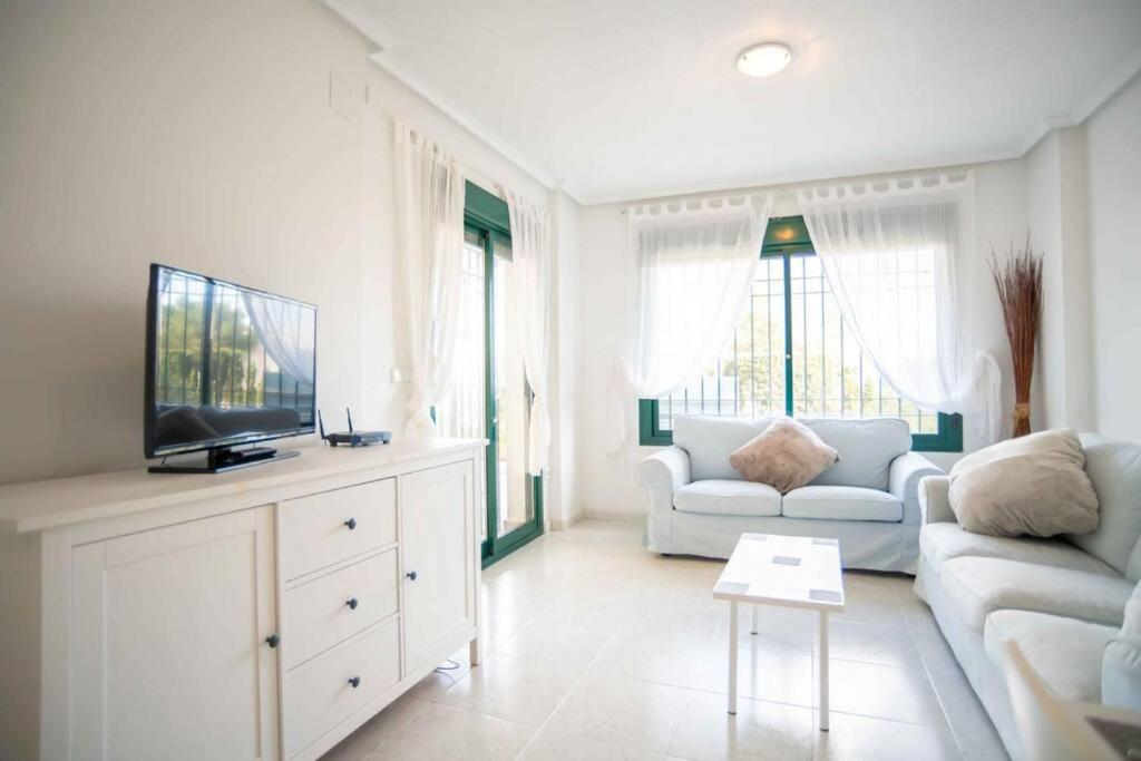 2 bedroom 2 bathroom ground floor apartment a short walk to the Campoamor 18 hole golf course photo 2