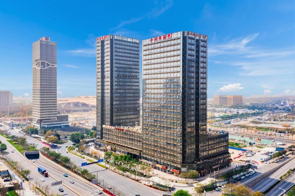 April Fair Duplex Apartment Guangzhou South Railway Station Ao Yuan Yue Shi Dai Branch photo 1