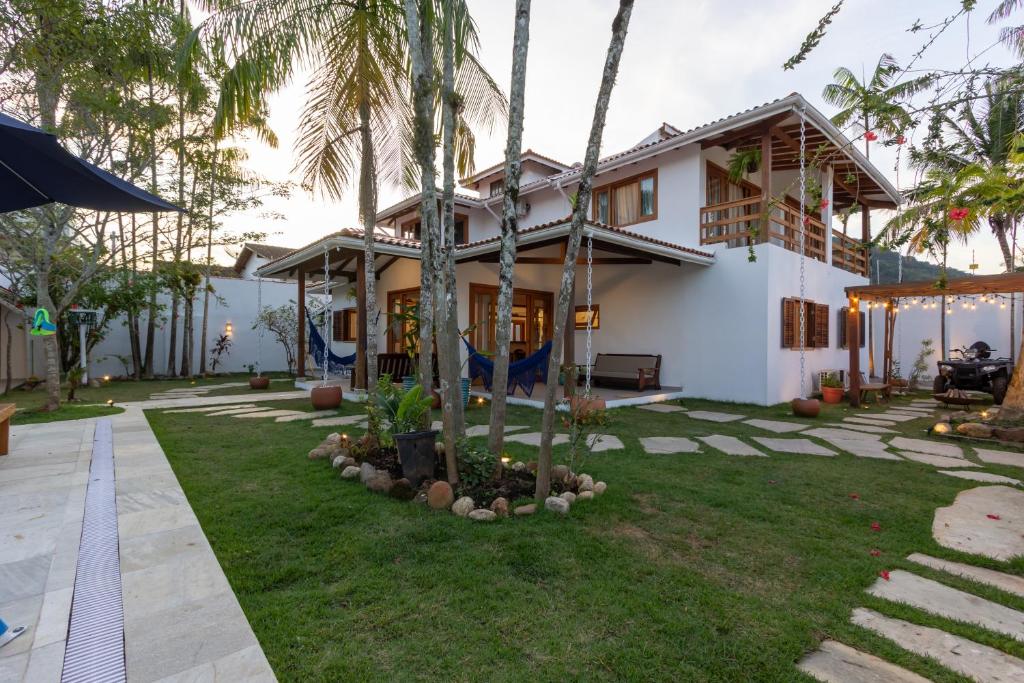 Chez Marguera em Juquehy - Luxo com muito espaço, conforto e lazer - incluso roupas de cama e banho, diarista, serviço praia, piscina aquecida, maquina gelo, cervejeira, karaoke - PET friendly photo 1