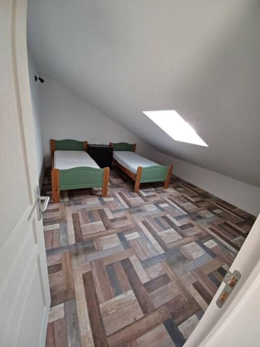 appartement aux dessus d'une maison photo 1