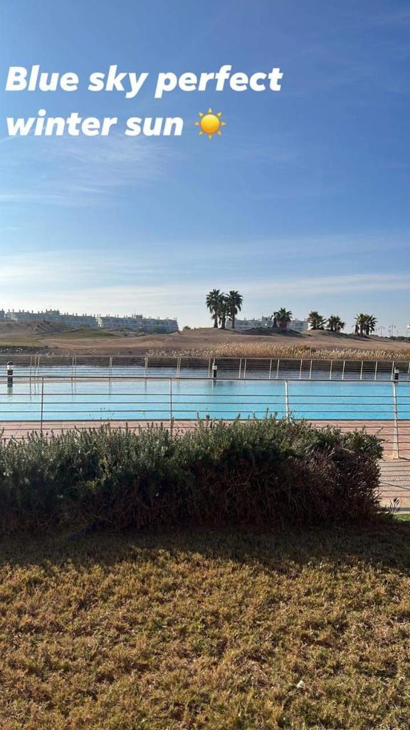 Luxury South Facing Golf Course Apartment & Pool in Roldan photo 3