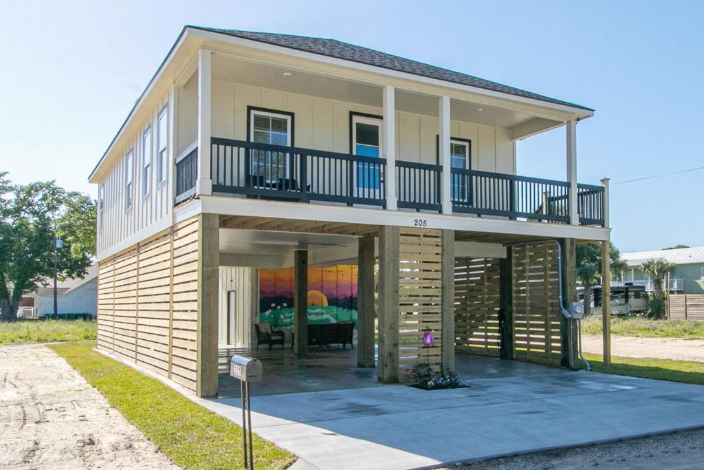 Luxury Family home near Casinos with King Bed, steps away from the Beach, Game Room, and Free Parking image