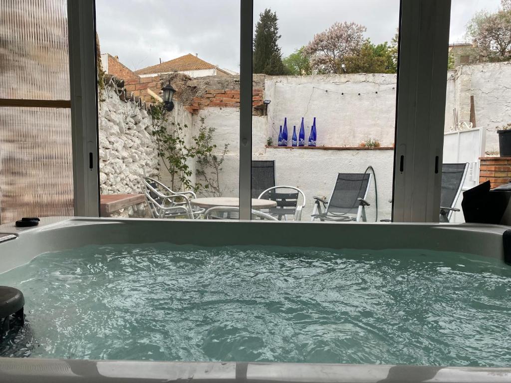 La Olivera APARTHotel Rural Suites bañera hidro o Jacuzzi privados photo 4