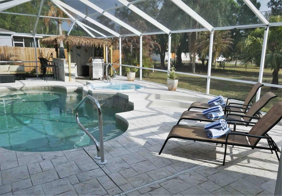 Peachland getaway with pool and tiki bar image