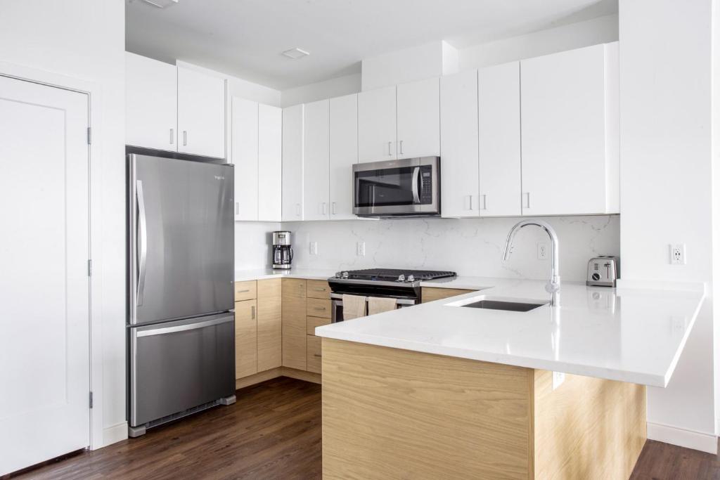 1BR w Gym WD Steps from Newtonville Train BOS-354 photo 4