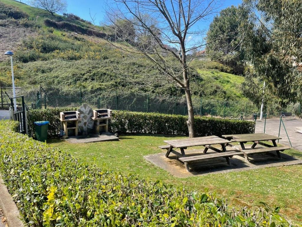 Piscina comunitaria y parking en Mogro photo 3