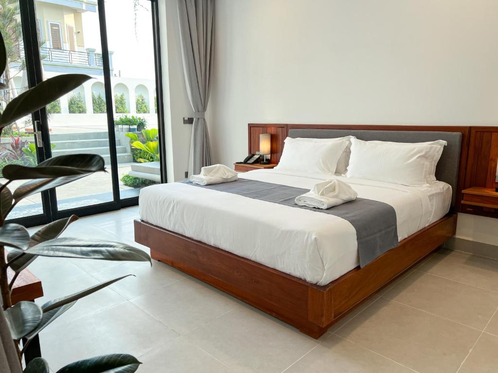 Emerald Residence Kampot - Tap to explore photos