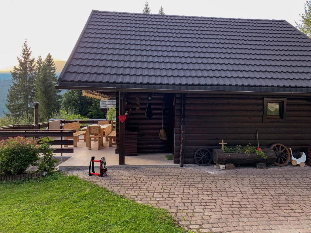 Dwarfs cabin overlooking Julian Alps near Bled photo 2
