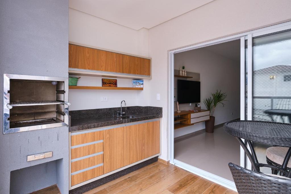 2 QUARTOS com Churrasqueira na Varanda, Piscina, Garagem interna, WiFi 500mbps, Ar Condicionado e Telas de Proteção photo 3