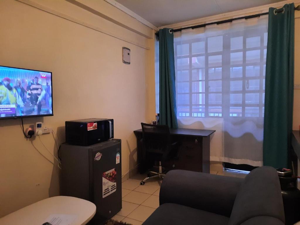 The Glam studio apartment Kinoo, FREE PARKING,NETFLIX Available photo 2