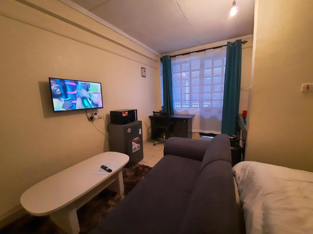 The Glam studio apartment Kinoo, FREE PARKING,NETFLIX Available photo 4