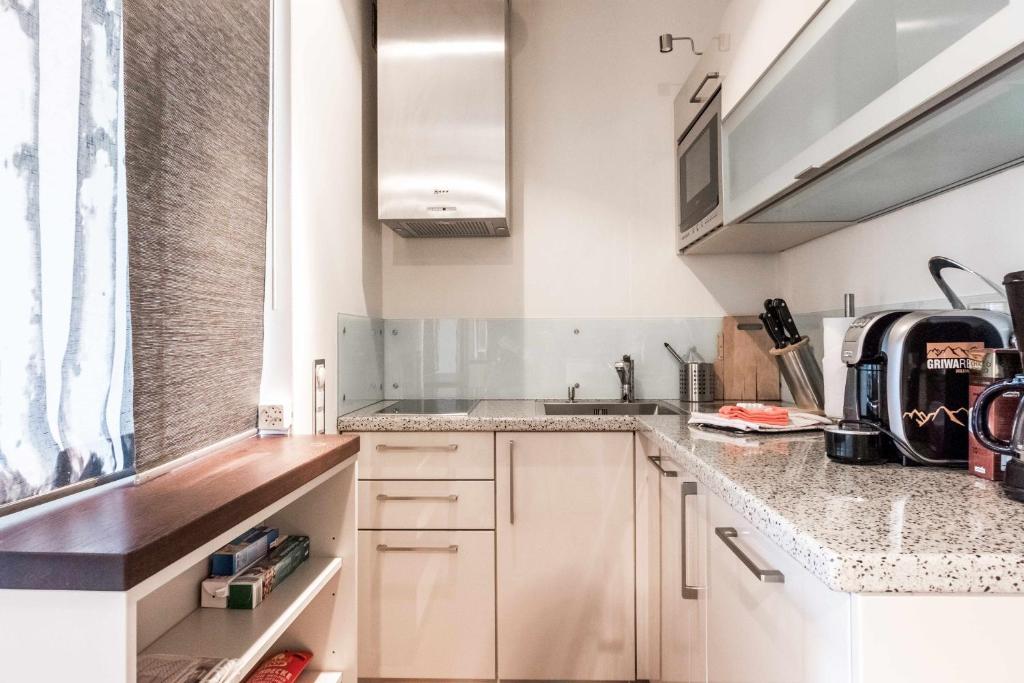 Apartment Alpenrose 2.5 mit Mitbenutzung SPA & Wellness - GRIWA RENT AG photo 3