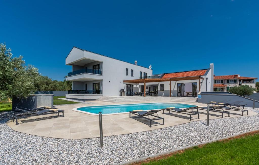 A lovely poolside villa in Krnica ideal for family photo 1