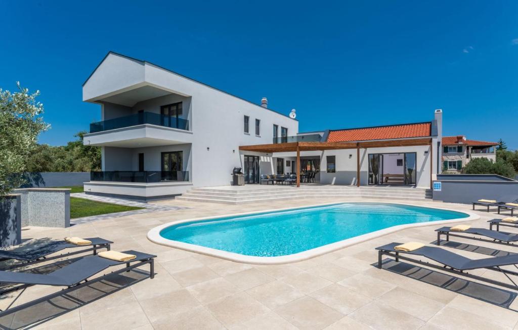 A lovely poolside villa in Krnica ideal for family photo 3