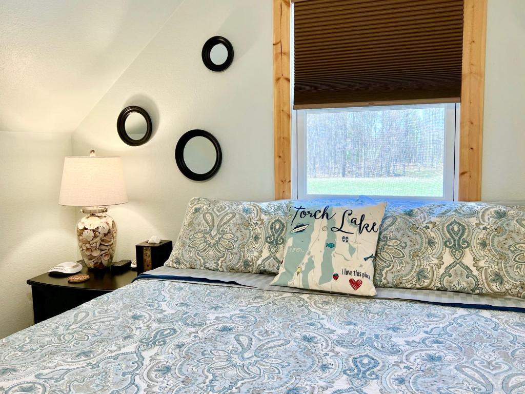 Torch Lake Bed & Breakfast - Tap to explore photos