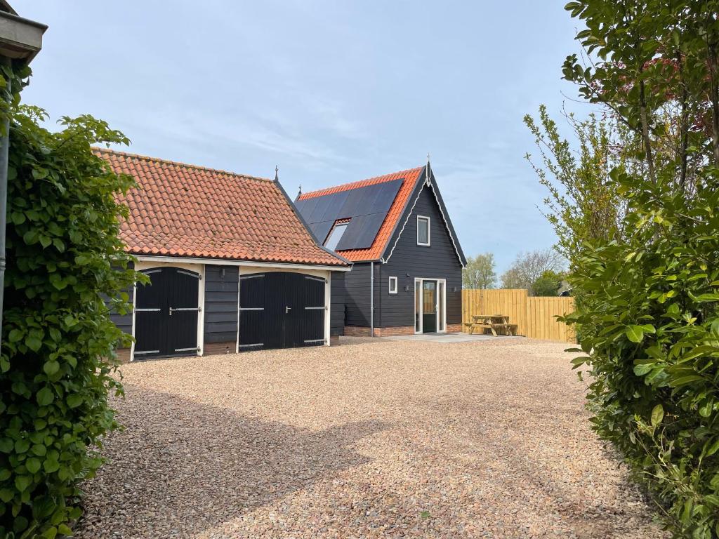Vakantiehuis T Koetshuis