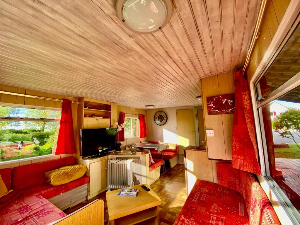 Mobilhome sous chalet en bois au calme à la ferme photo 4