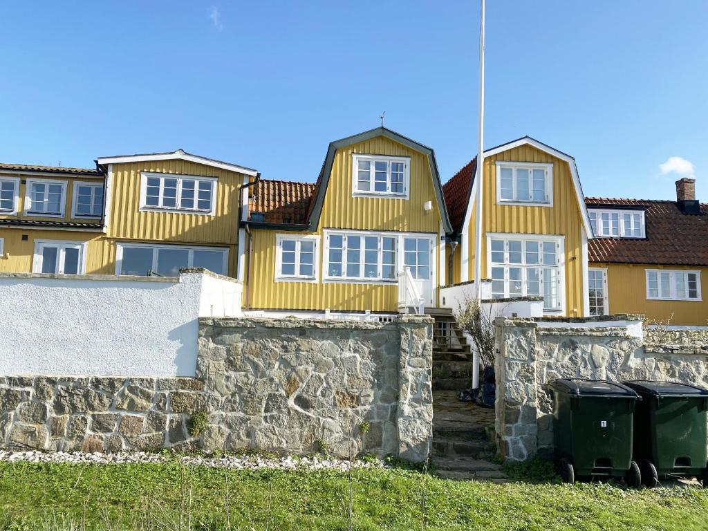 Street house by Torekov harbor with sea view photo 2