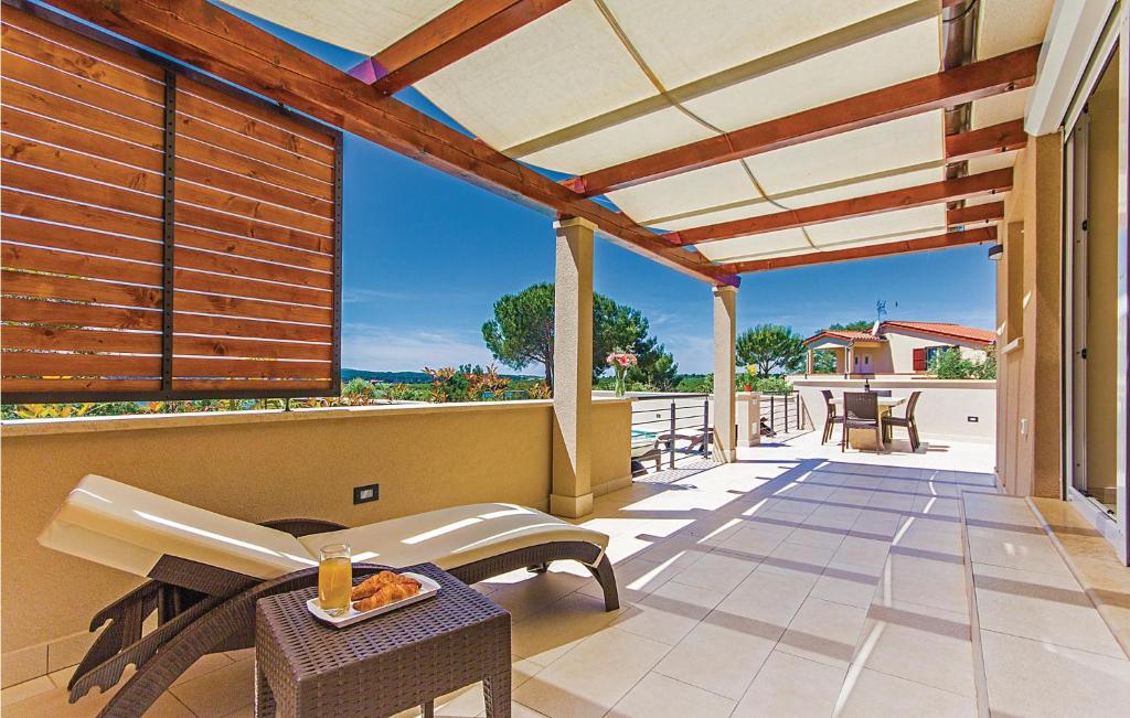 Amazing Home In Pomer With 2 Bedrooms, Wifi And Outdoor Swimming Pool photo 4