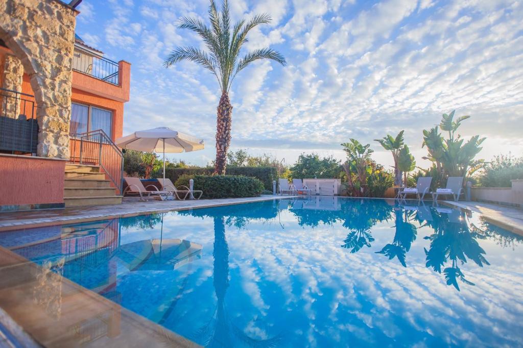 Villa Saraliana Sandy Beach Villas - Heated Pool - Jacuzzi - Private Beach Area photo 1