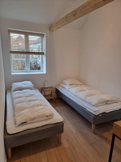 Hyggeligt lille byhus lige mellem havnen og bytorv photo 3