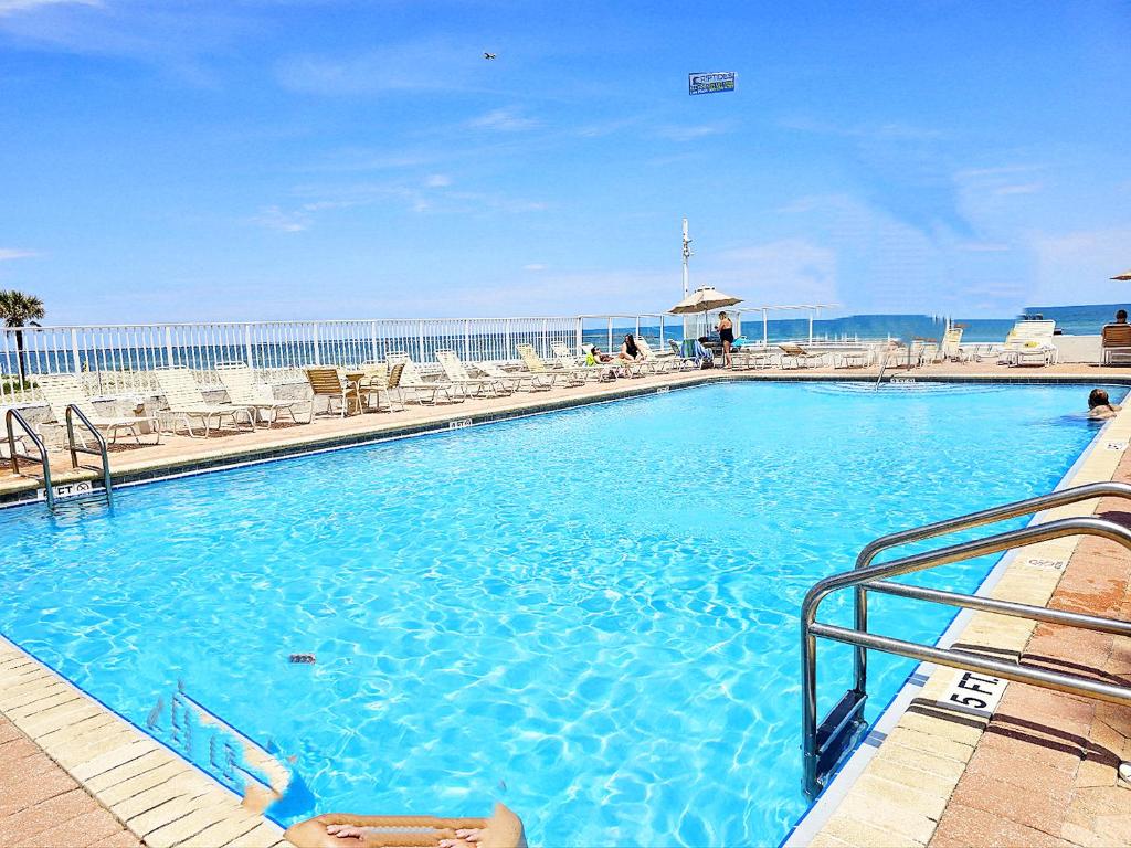 Oceanfront Escape With Balcony and heated salt water pool! photo 1