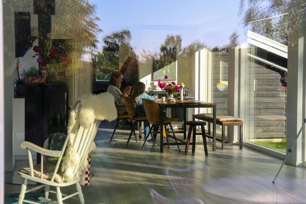Bright summer house close to the beach and water photo 1