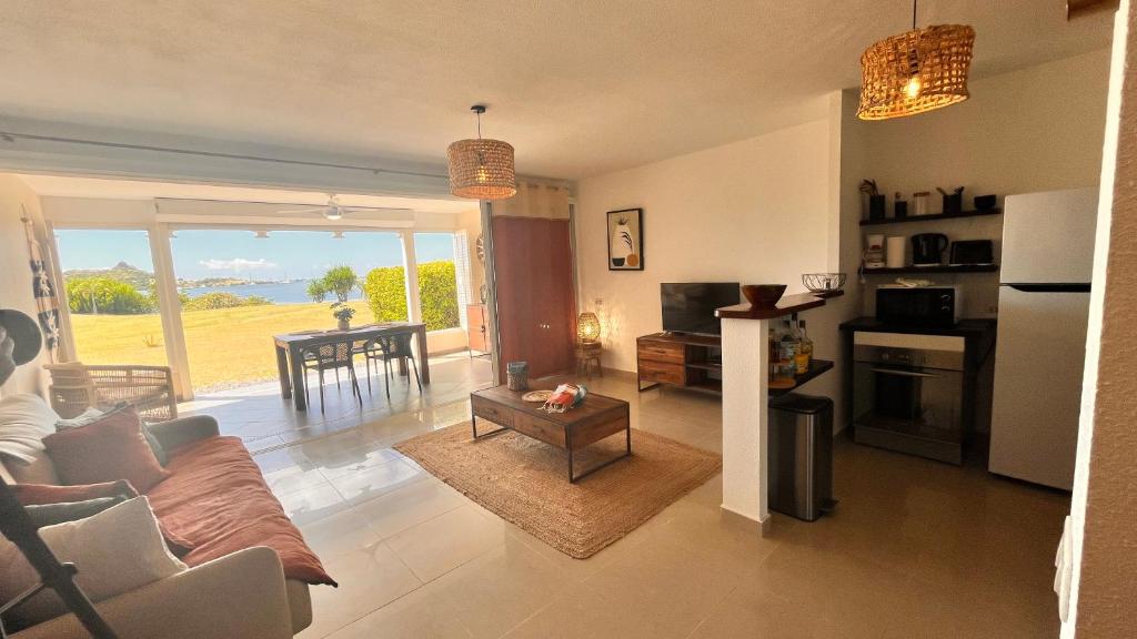 Le Baileys - Spacieux appartement en rez-de-jardin vue lagon photo 2