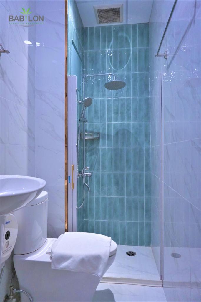 Babylon Serviced Apartment - Tap to explore photos