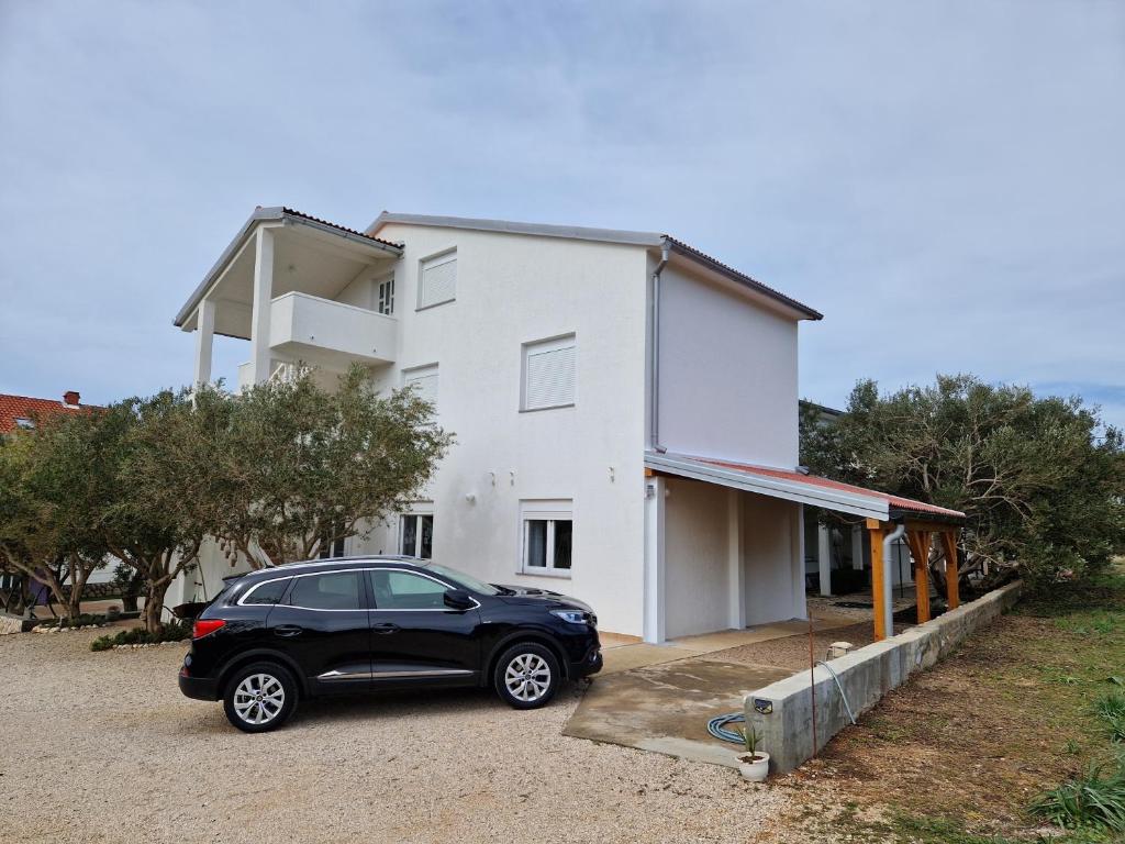 Seaside apartments with a swimming pool Barbat, Rab - 4951 photo 1